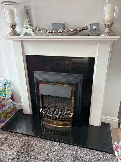 Fireplace with electric inset.