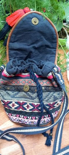 Accessorize small bucket bag