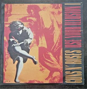 Guns n Roses very rare Zimbabwe Pressing. Use your illusion 1  Vinyl, vg+ .The sleeve is VG+.  Small splits to mid front opening. Small tear to back