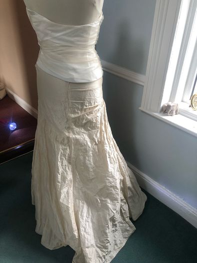 Brand new Rembo designs ivory and champagne wedding dress