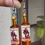 Mini Spiced Rum Bottle Drop Earrings. Image 4