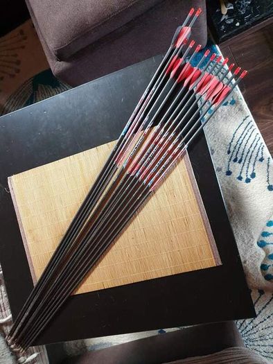 Recurve bow with arrows