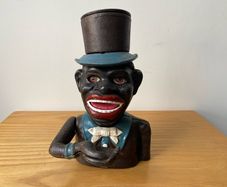 Piggy Bank Cast Iron Jolly Man Money Box J.E. Stevens 1920's