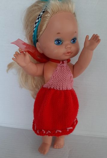 collectable vintage matel doll in original clothes