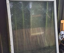 Large double galzed window (damage)