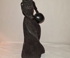African woman with water jug statue