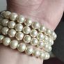 A beautiful faux pearl butterfly bracelet. Image 6