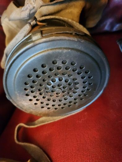 Three gas masks.