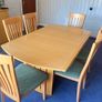8-10 Oak Veneer Dining Table + 6 chairs Image 2