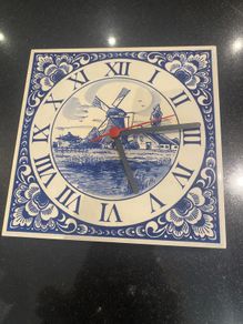 Blue tile clock with windmill