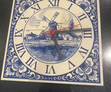 Blue tile clock with windmill