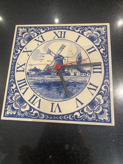 Blue tile clock with windmill