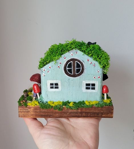 handcrafted fairy cottage with moss roof!
