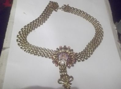 a vintage gold colour penden