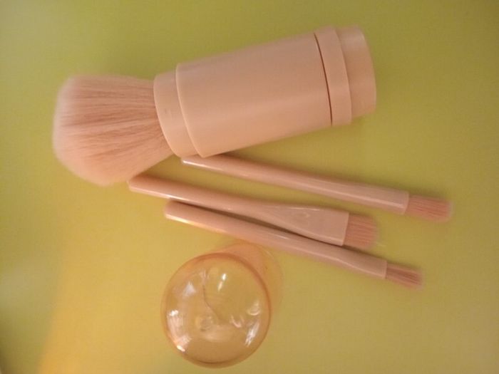 Portable makeup brush
