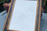 Vintage bevelled mirror in a gilded frame