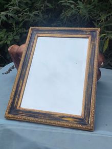 Vintage bevelled mirror in a gilded frame