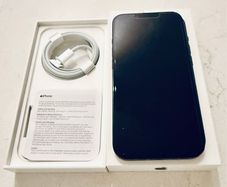 iPhone 13 with chargers and cases