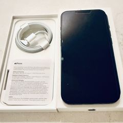 iPhone 13 with chargers and cases
