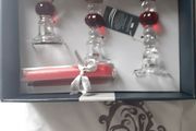 Newgrange candle holders new in box .20 euro .Would make a lovely christmas present .Glass with red and candles