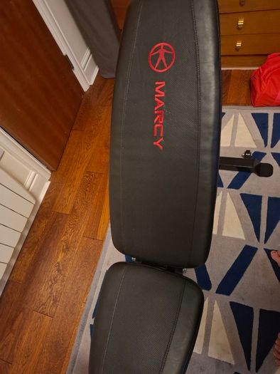 Weight bench with leg extensions