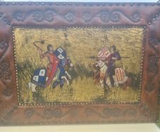 Vintage large leather painting of a medieval knights duel