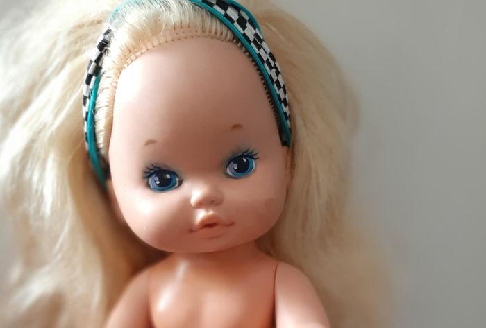 collectable vintage matel doll in original clothes