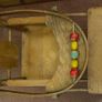Vintage wooden doll high chair FROM THE 1930S featuring a built-in play tray with a wire bead Image 3