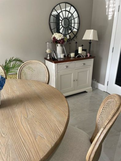 Dining table round 140cm with 6 rattan back chairs