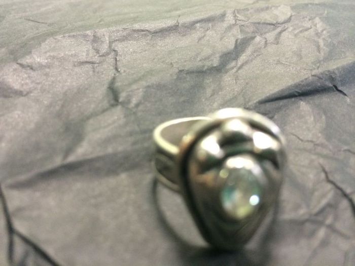 Silver ring with white  stone