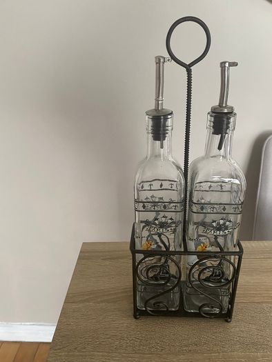 Reduced Set of tall oil and vinegar bottles in stand