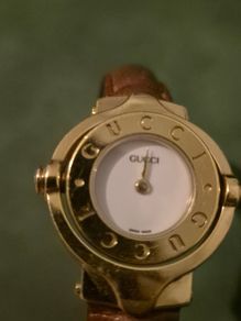 Gucci Gold Plated Reverso Womens Watch