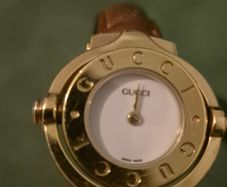 Gucci Gold Plated Reverso Womens Watch