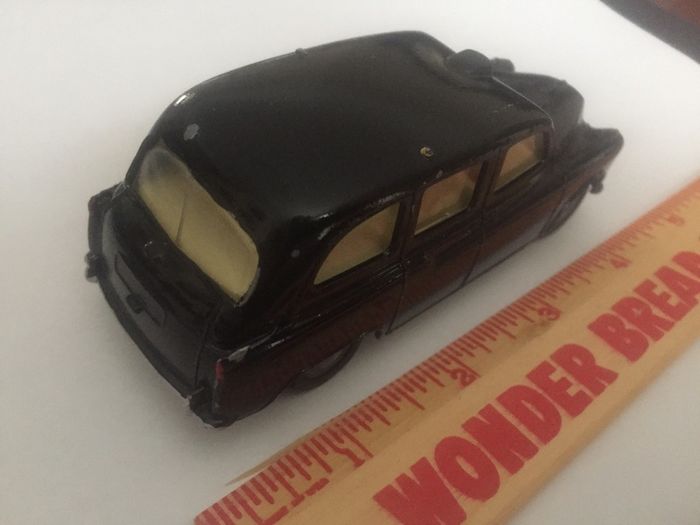 Spot-on. Tri-ang. Austin Taxi FX4.