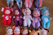 Mini baby dolls in sweet outfits