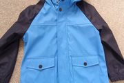 NEW.boy's rain jacket. Age 6/7