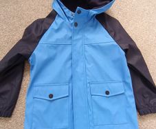 NEW.boy's rain jacket. Age 6/7