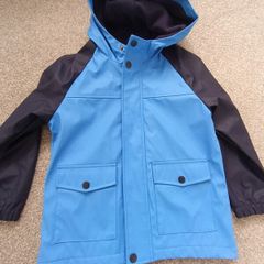 NEW.boy's rain jacket. Age 6/7