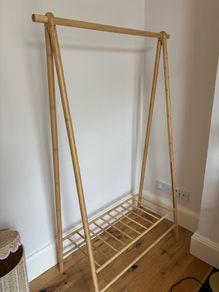 wooden clothes rail