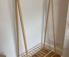 wooden clothes rail