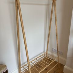 wooden clothes rail