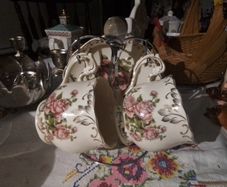Two China Cups & Saucers with Spoons on a Stand