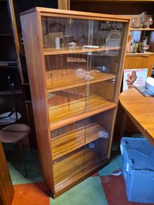 mid-century book case display glass doors teak