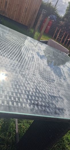 Rattan glass top table and 4 chairs