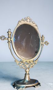 Antique brass mirror