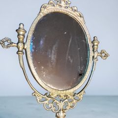 Antique brass mirror