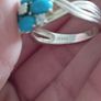 A 925 sterling silver ring with turquoise, opal, and topaz. Image 6