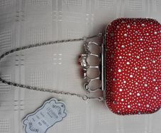Red Skull Knuckle Clutch Bag Looks Amazing