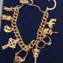 Vintage 9ct yellow gold charm bracelet Image 3