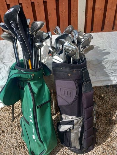 A selection of golf clubs and bags. Golf balls